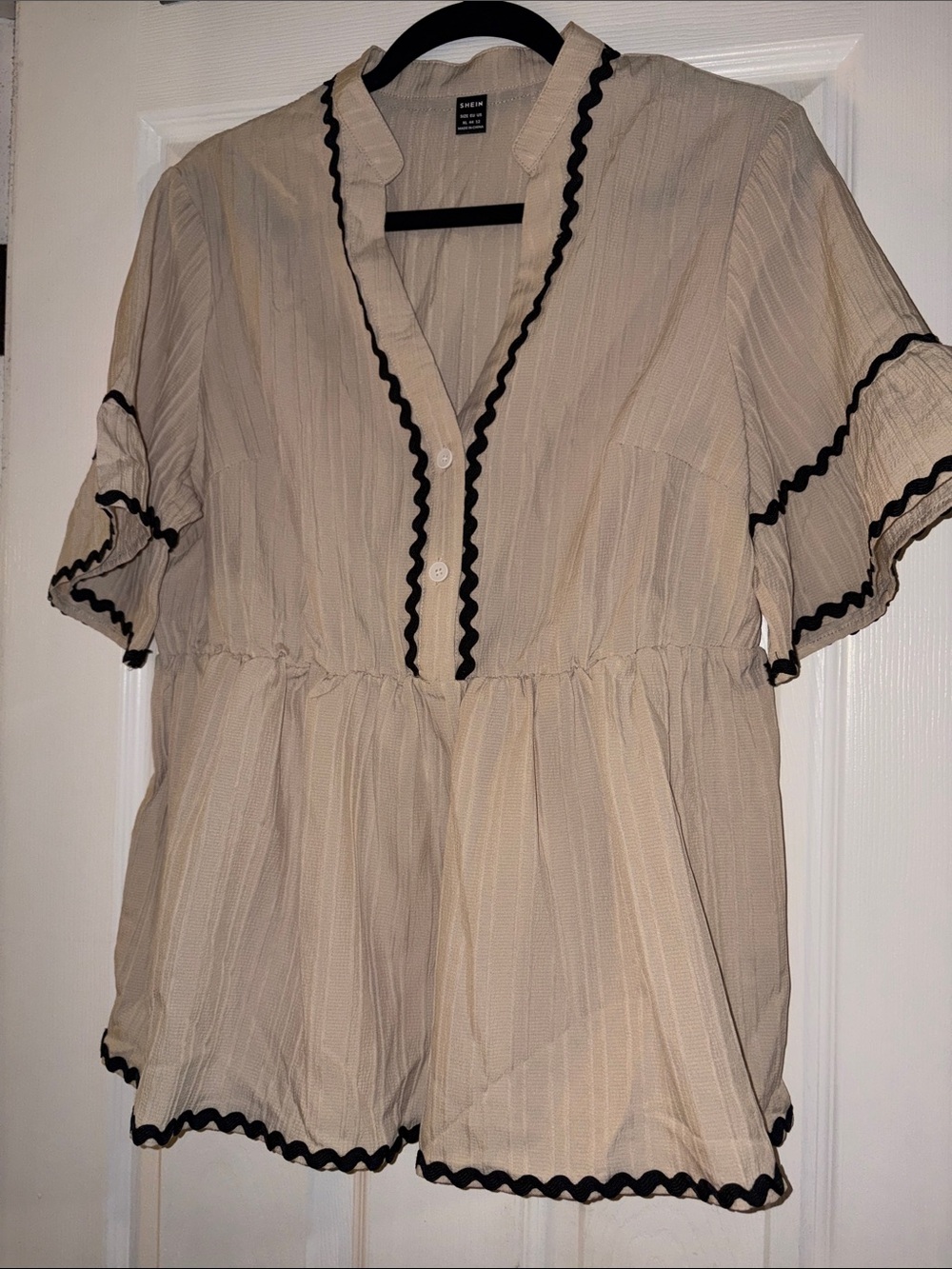 SHEIN Cream Button-Front Peplum Top with Black Trim